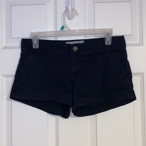Cotton on black short shorts.